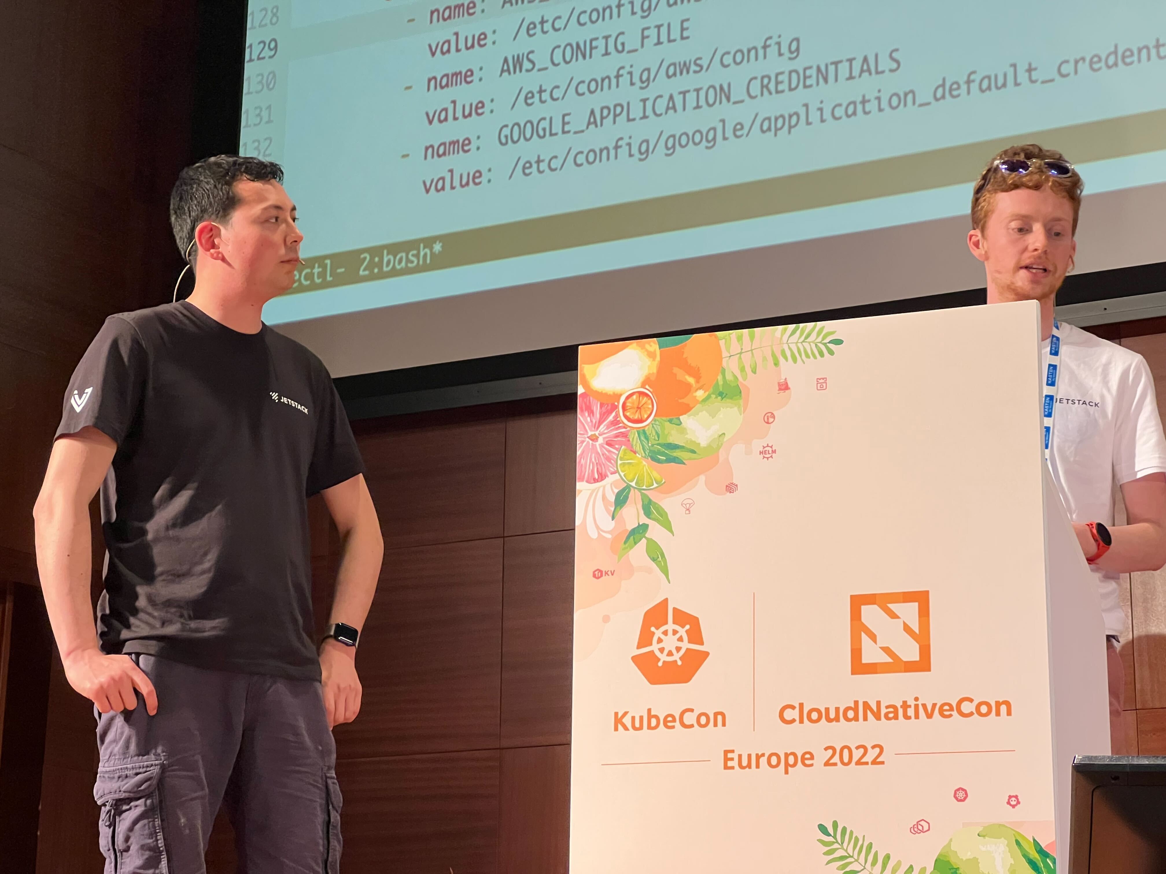 Jake and Charlie on stage at KubeCon